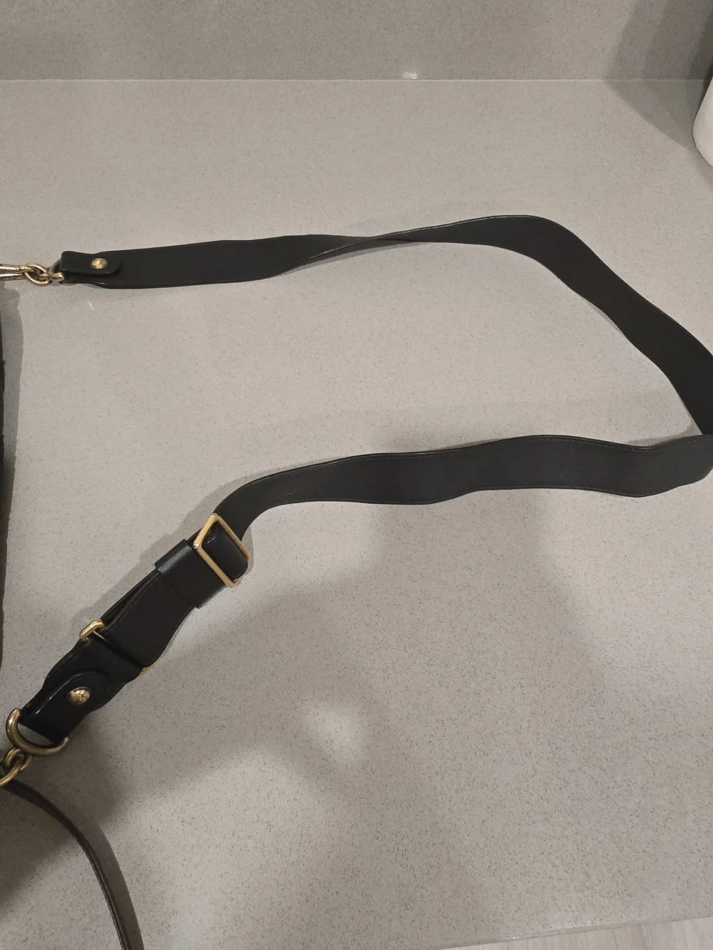 CHANEL Black Quilted Shoulder Bag with Gold Turn-Lock, Long Cross Body Strap